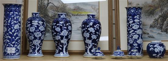 A pair of 19th century Chinese blue and white sleeve vases, three further vases and a ginger jar tallest 30.5cm